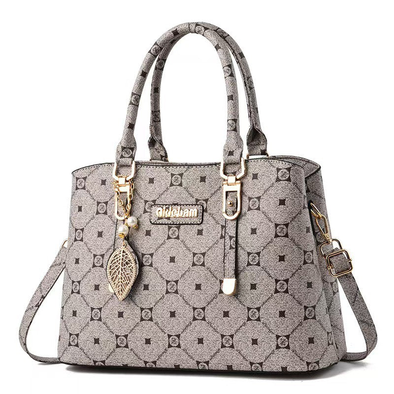 Qidcham Elegant Handbag – Brown with Leaf Charm