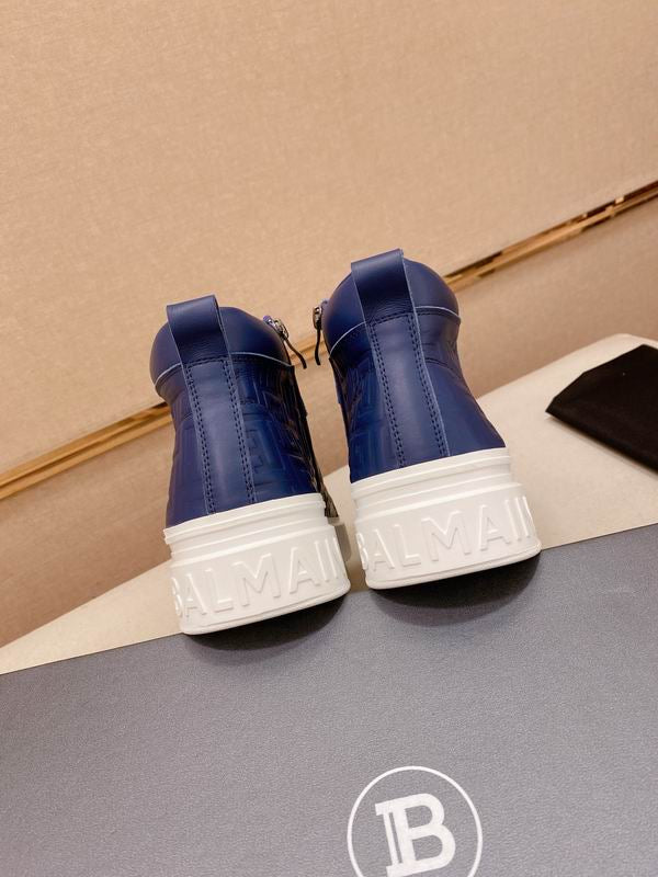 Navy Embossed High-Top Sneakers on Display