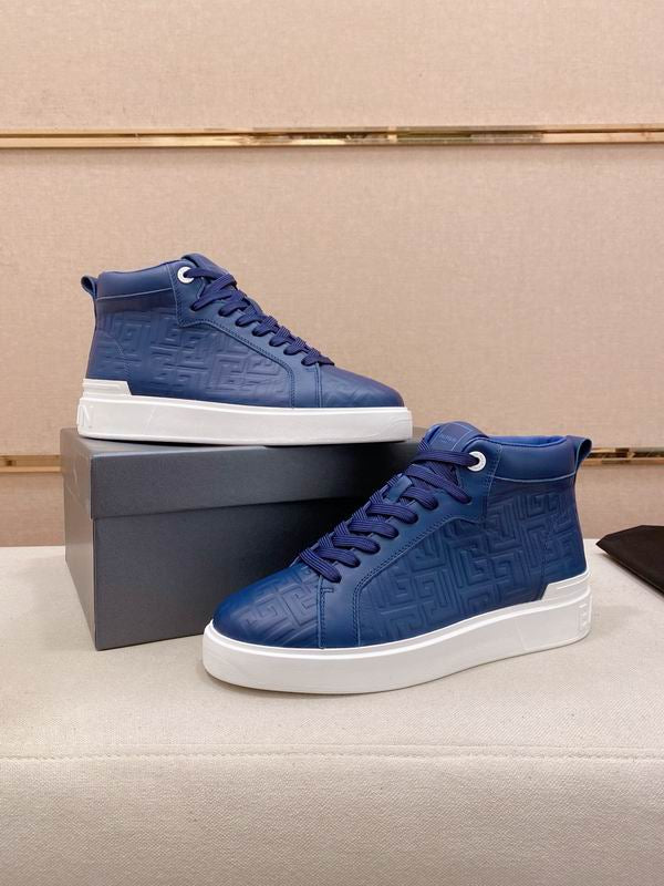 Navy Embossed High-Top Sneakers on Display