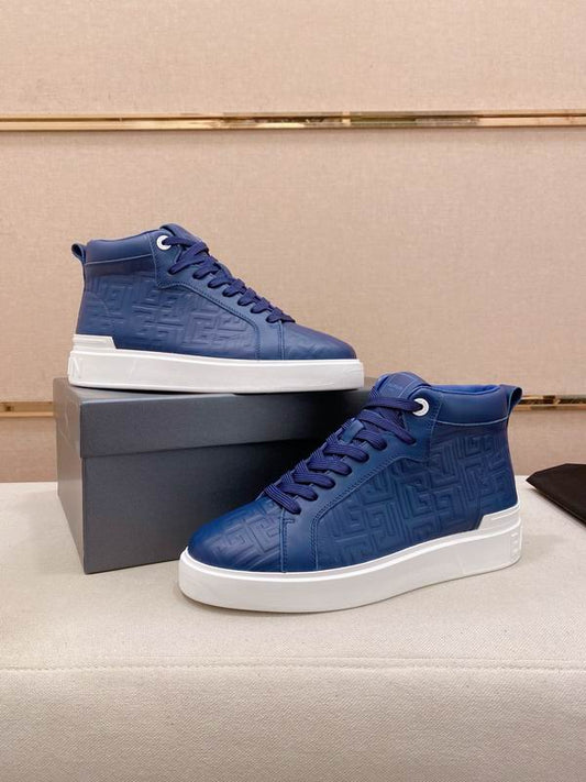 Navy Embossed High-Top Sneakers on Display